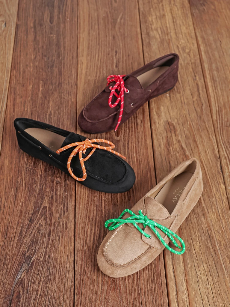 Suede loafers with green laces