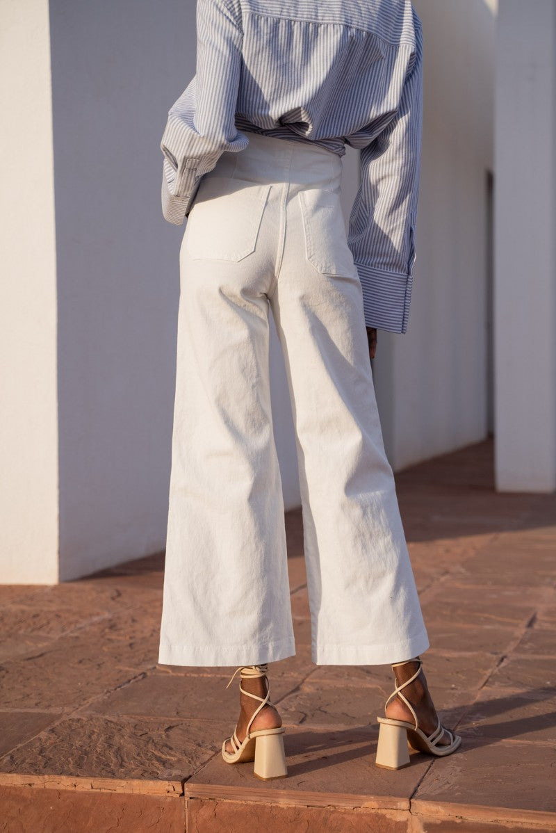 Wide leg white jeans with front buttons