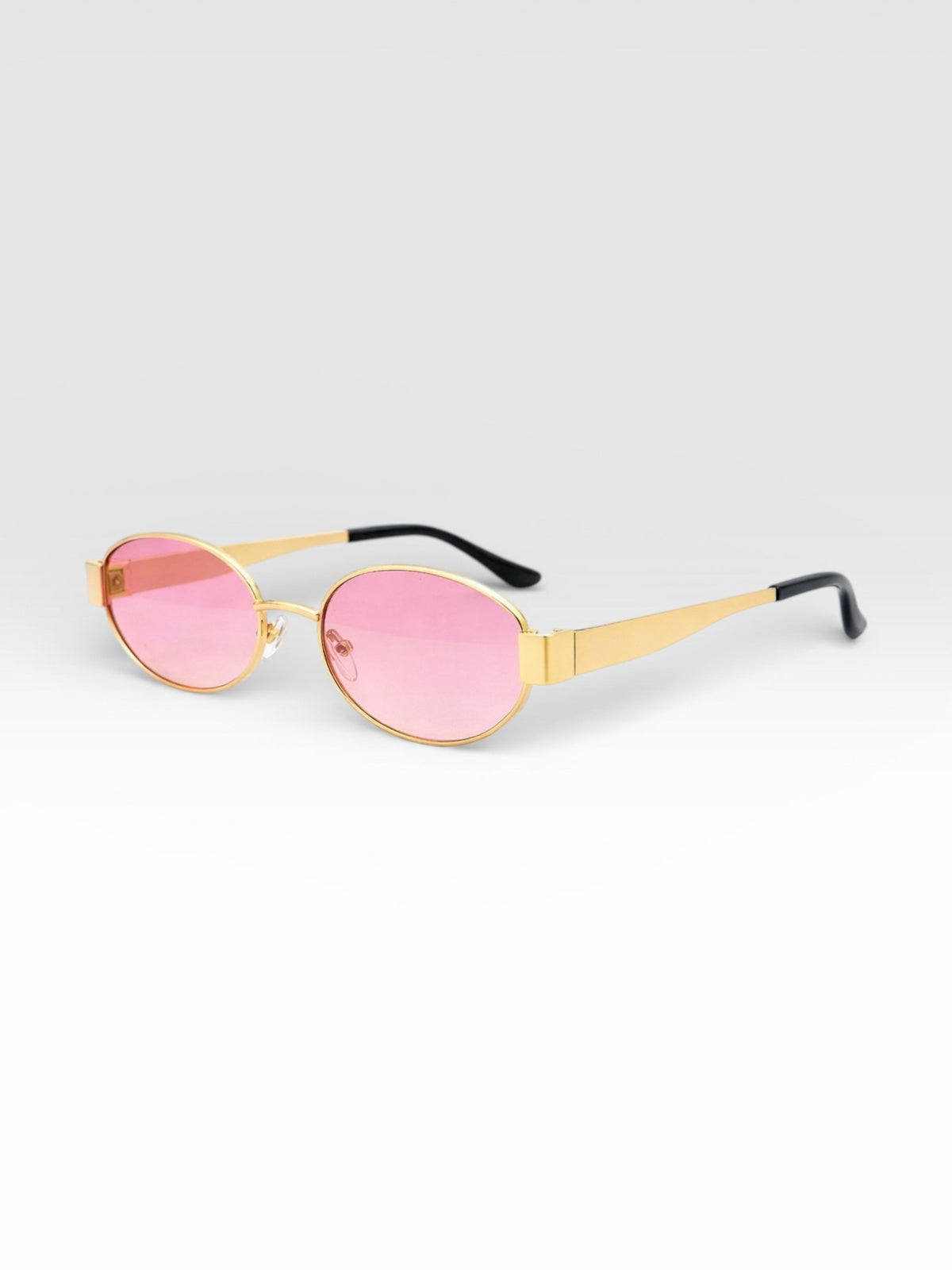 Gold frame pink lens sunglasses