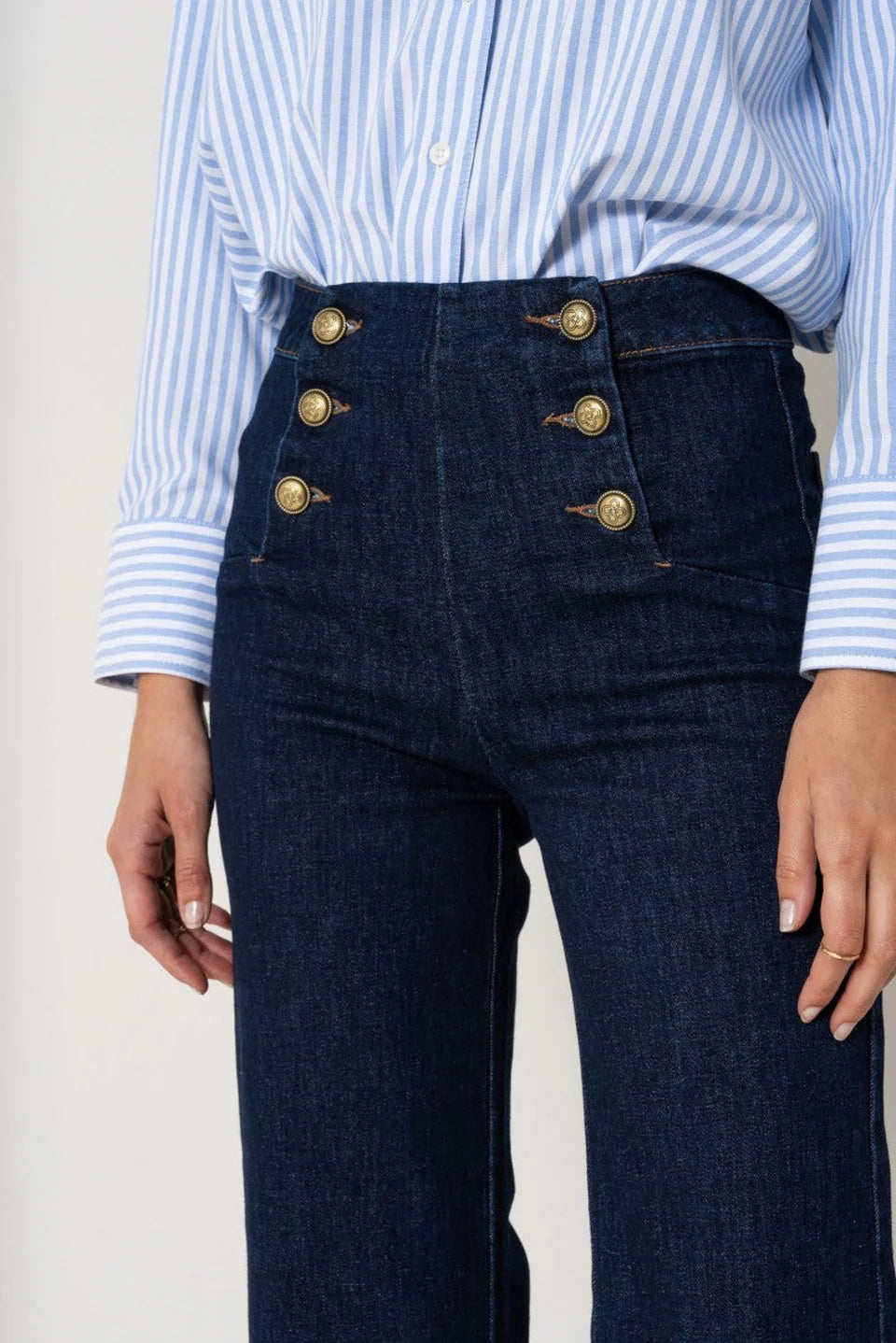 Dark blue wide leg jeans with front gold buttons