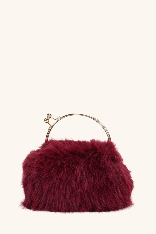 Burgundy faux fur gold handle clutch bag